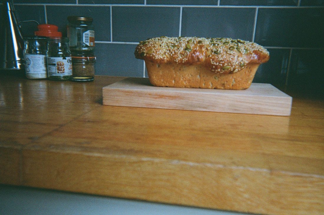 A seeded loaf on a board