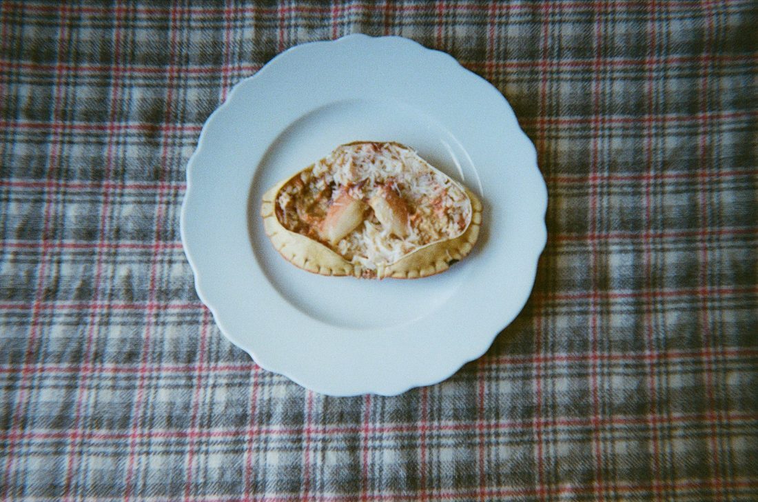 A plated pie on tartan cloth
