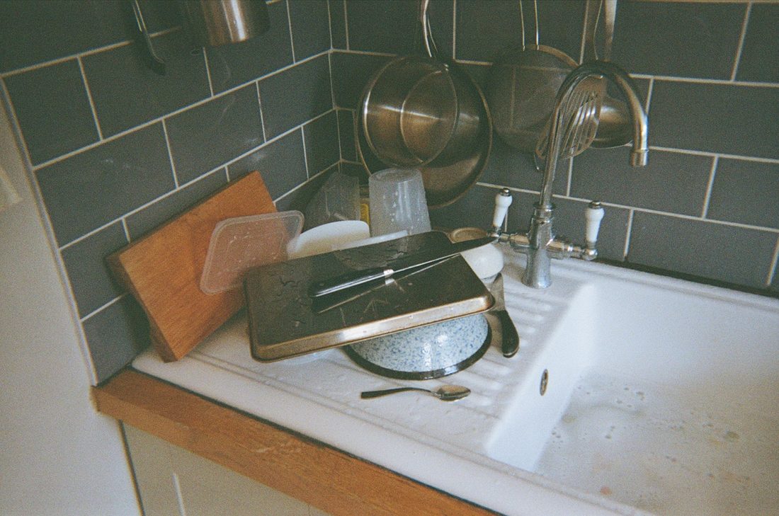 Sink and stacked dishes